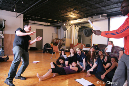 Director Alfred Preisser rehearsing with the cast of CALIGULA MAXIMUS © Lia Chang
